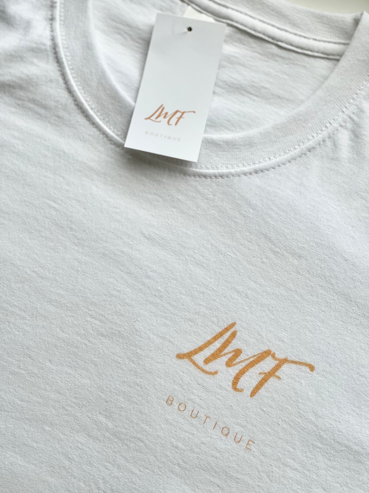 (#62) LMF boutique White T-Shirt - NEW